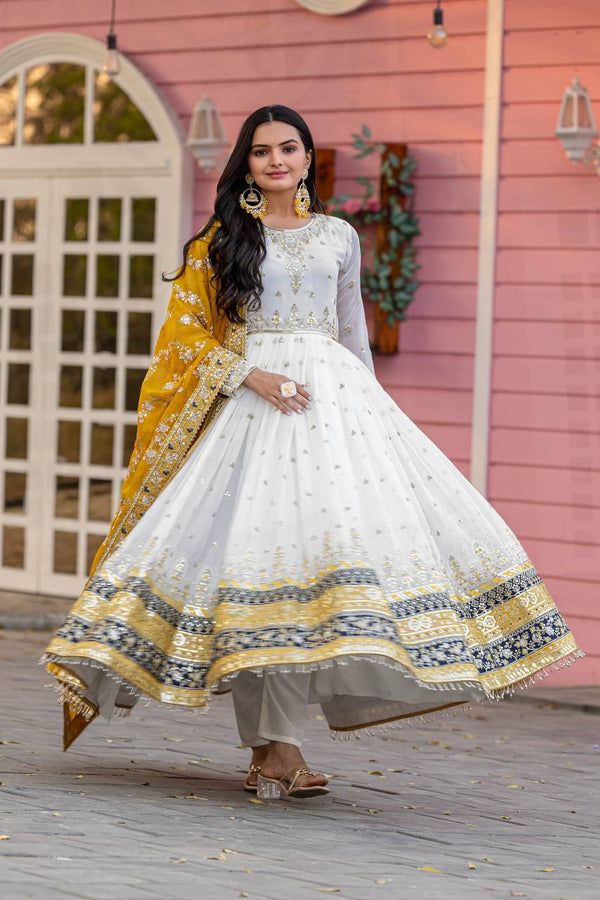 White Anarkali Gown with Mustard Yellow Embroidered Dupatta – Royal Festive Edition